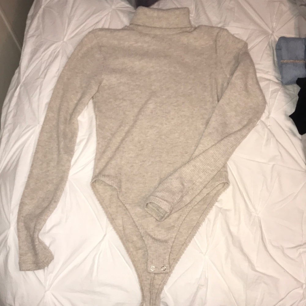 A turtleneck body suit!!